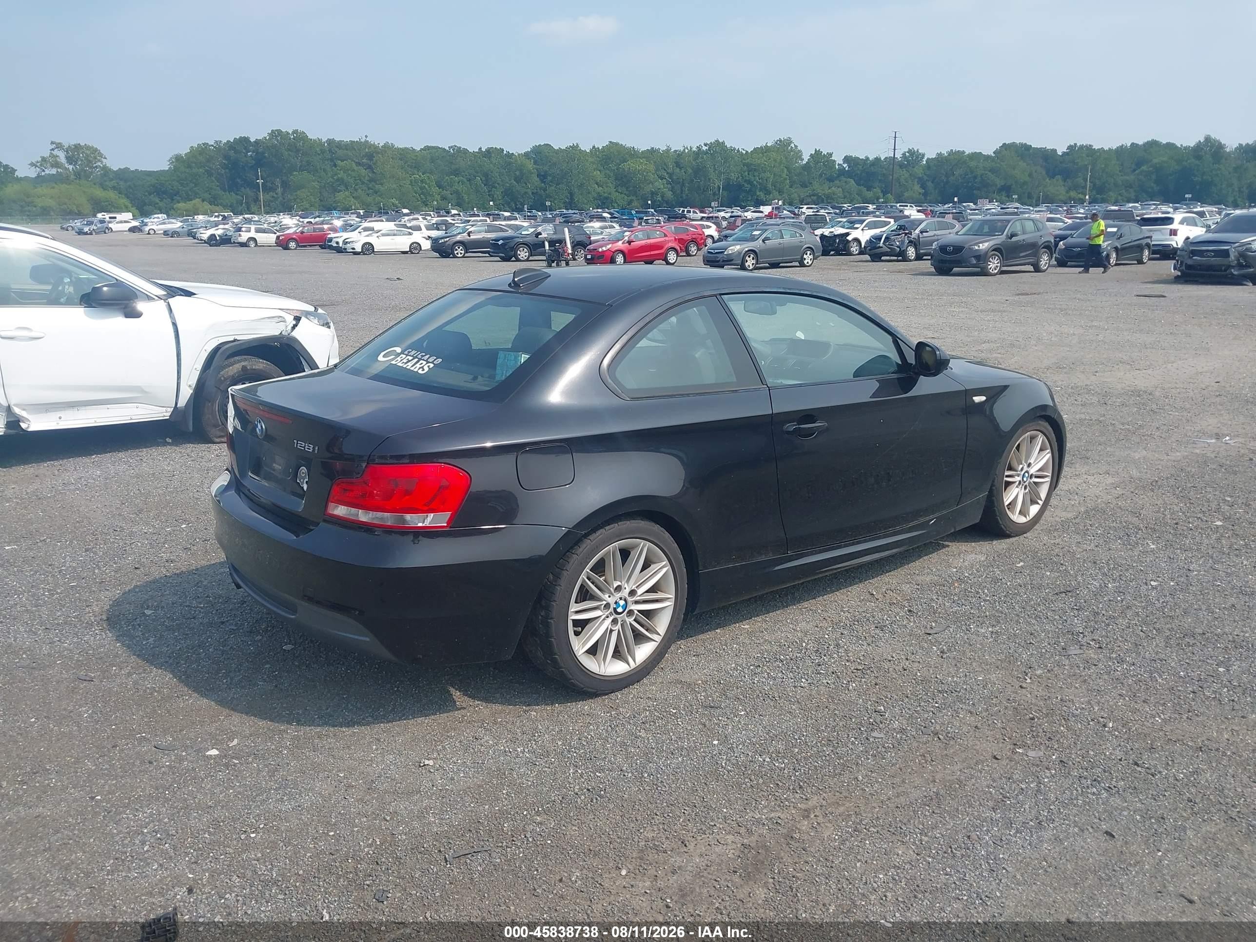 2012 Bmw 128i   Черный vin: WBAUP9C54CVL91151