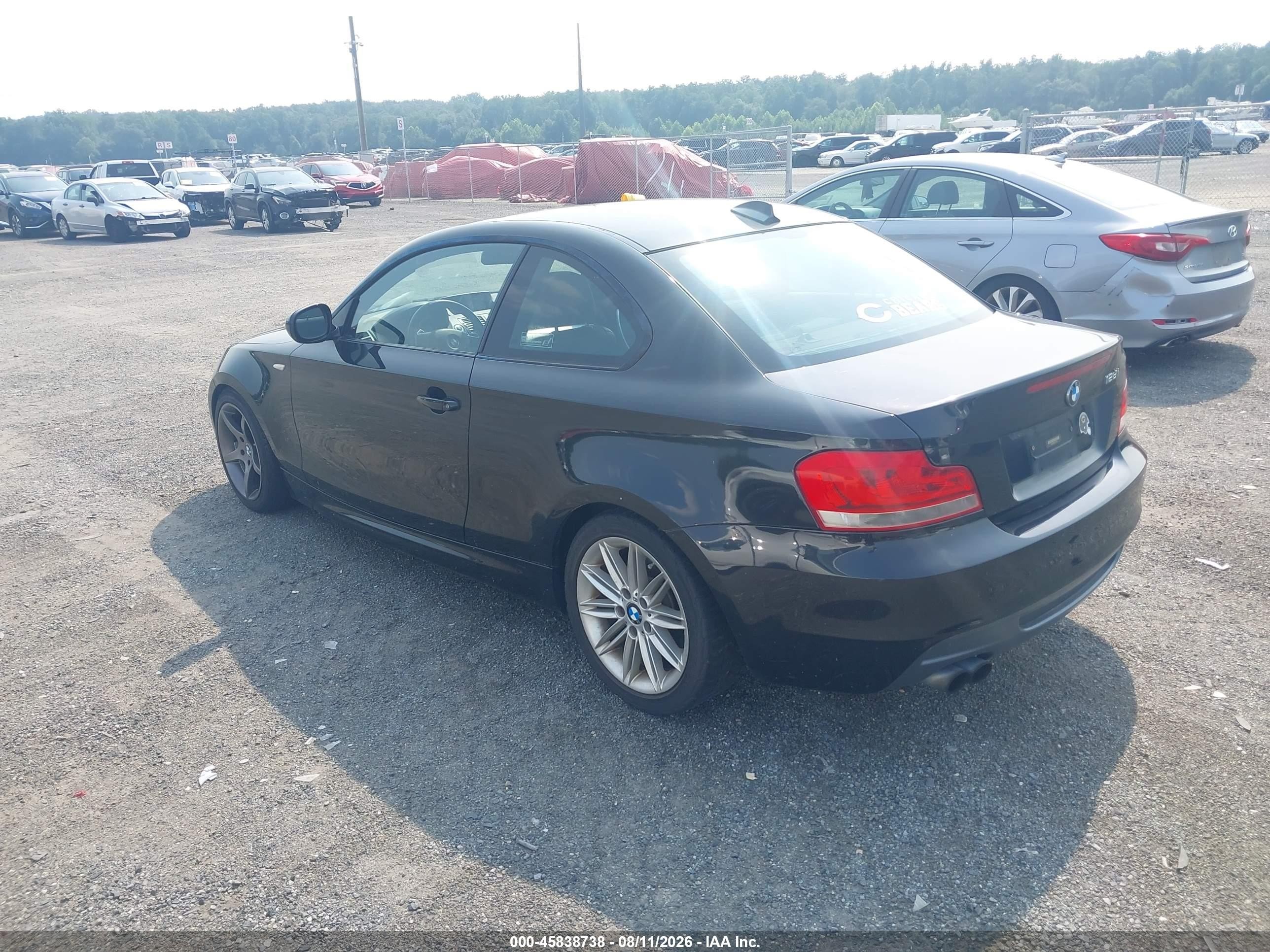 2012 Bmw 128i   Черный vin: WBAUP9C54CVL91151