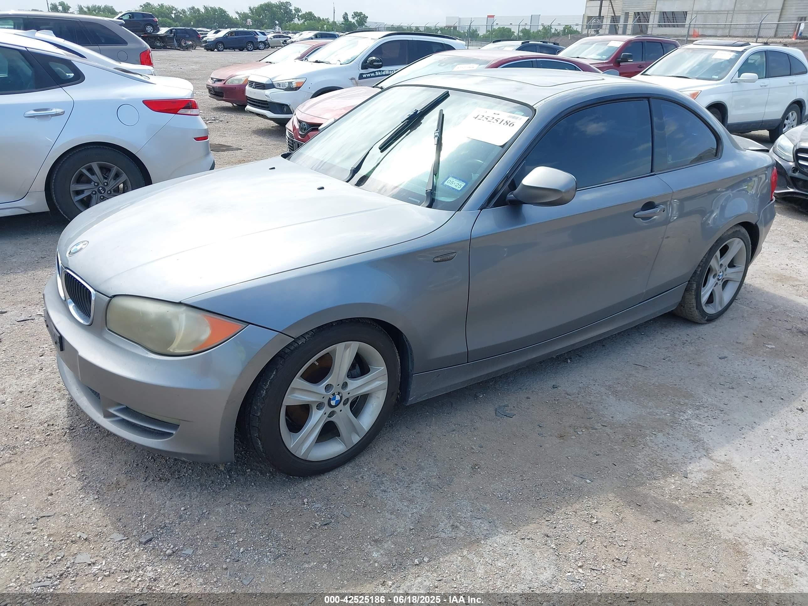 2010 Bmw 128i   Серый vin: WBAUP9C56AVF49473