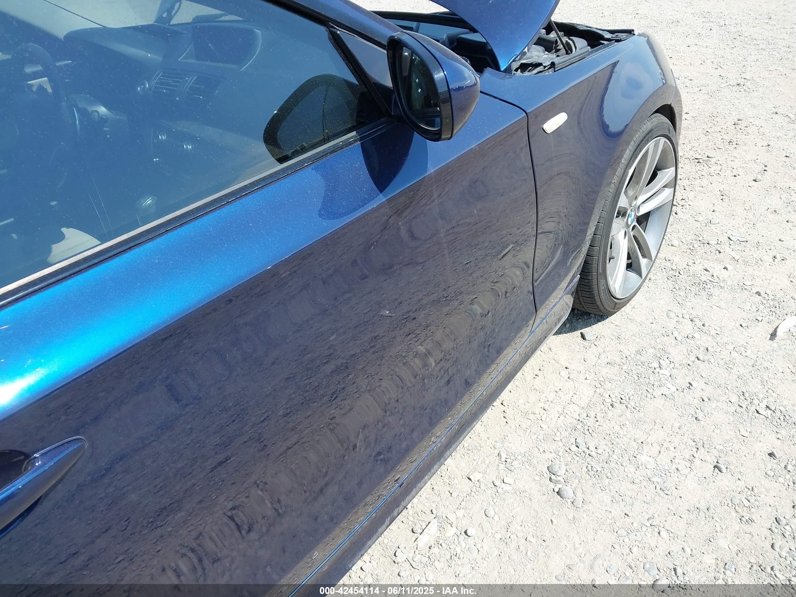 2012 Bmw 128i   Dark Blue vin: WBAUP9C57CVL91385