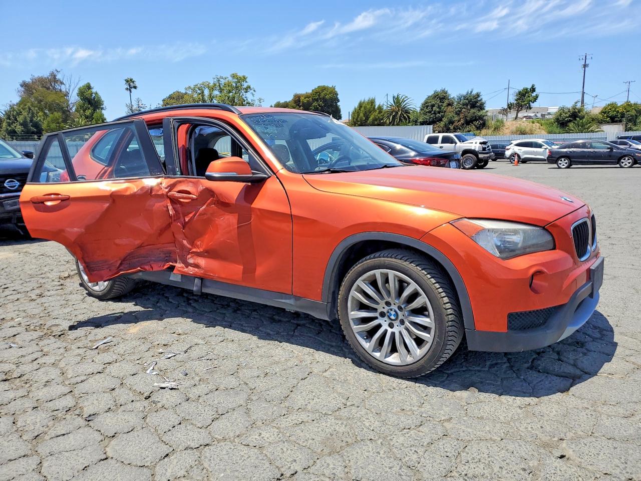 2014 Bmw X1 Orange vin: WBAVM1C52EVW49541