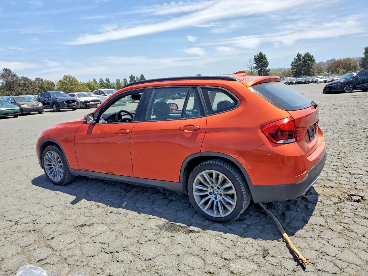 2014 Bmw X1 Orange vin: WBAVM1C52EVW49541