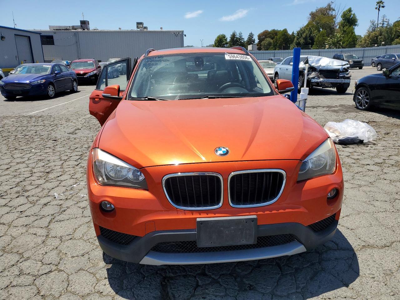 2014 Bmw X1 Orange vin: WBAVM1C52EVW49541