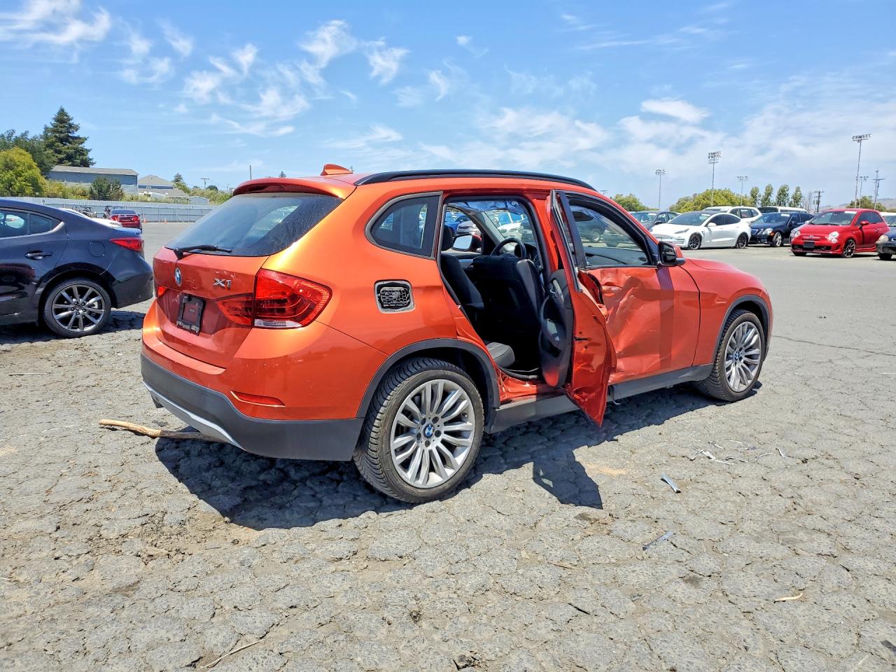 2014 Bmw X1 Orange vin: WBAVM1C52EVW49541