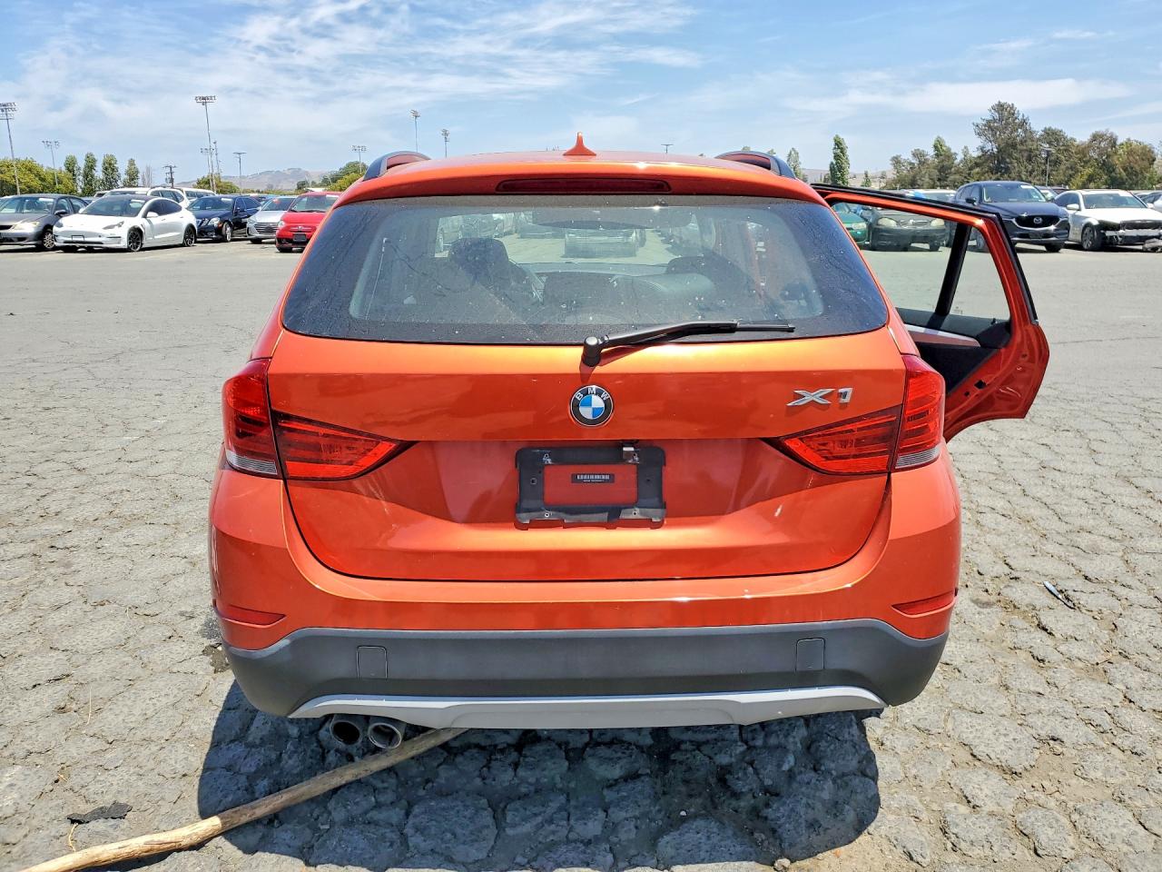 2014 Bmw X1 Orange vin: WBAVM1C52EVW49541