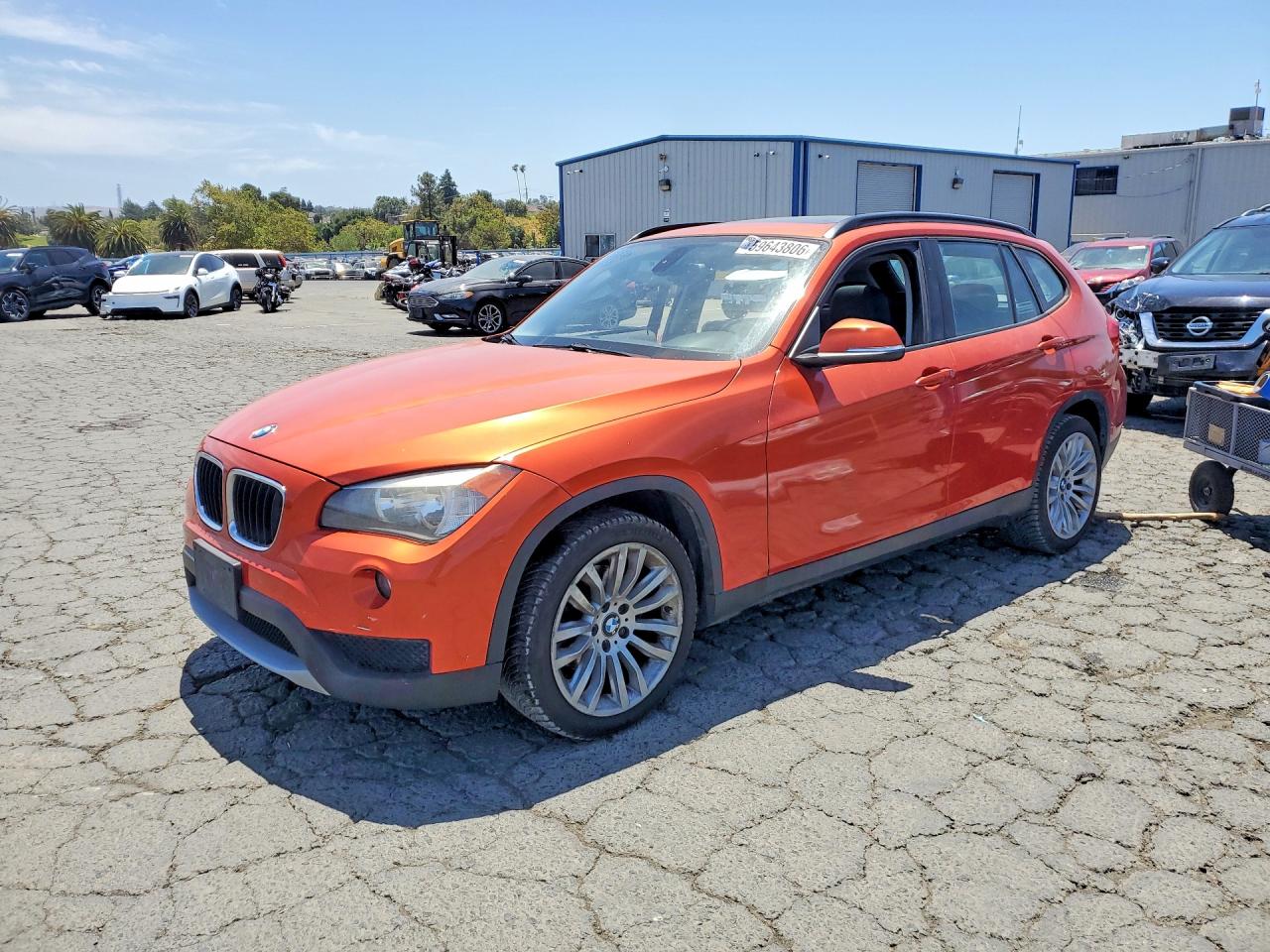 2014 Bmw X1 Orange vin: WBAVM1C52EVW49541