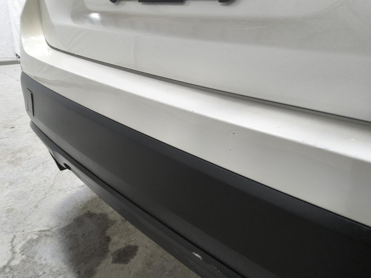 2015 Bmw X1 Sdrive28i White vin: WBAVM1C57FV318150 Damage: Rear Bumper Center Molding, Chipped, 2