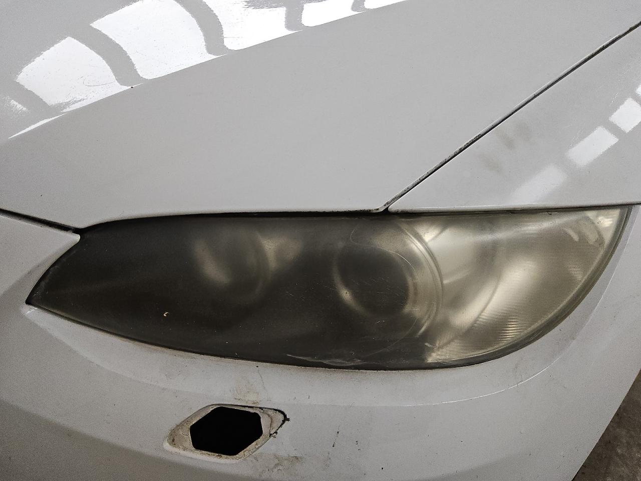 2009 Bmw 335 I White vin: WBAWL73519P473750 Damage: Left Head Lamp, Faded, Acceptable