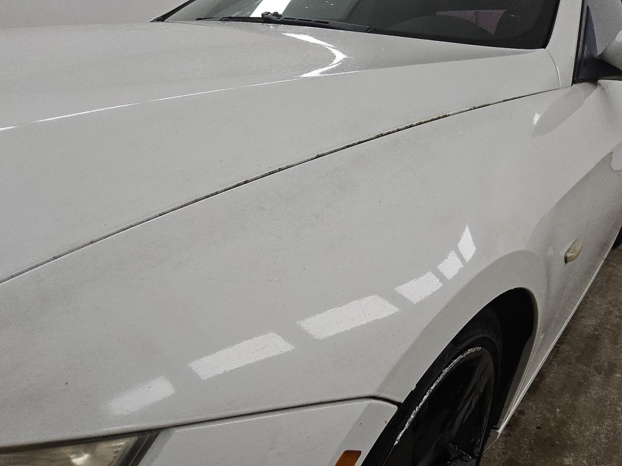 2009 Bmw 335 I White vin: WBAWL73519P473750 Damage: Left Front Fender, Heavy Scratch, 1 To 2 Inches