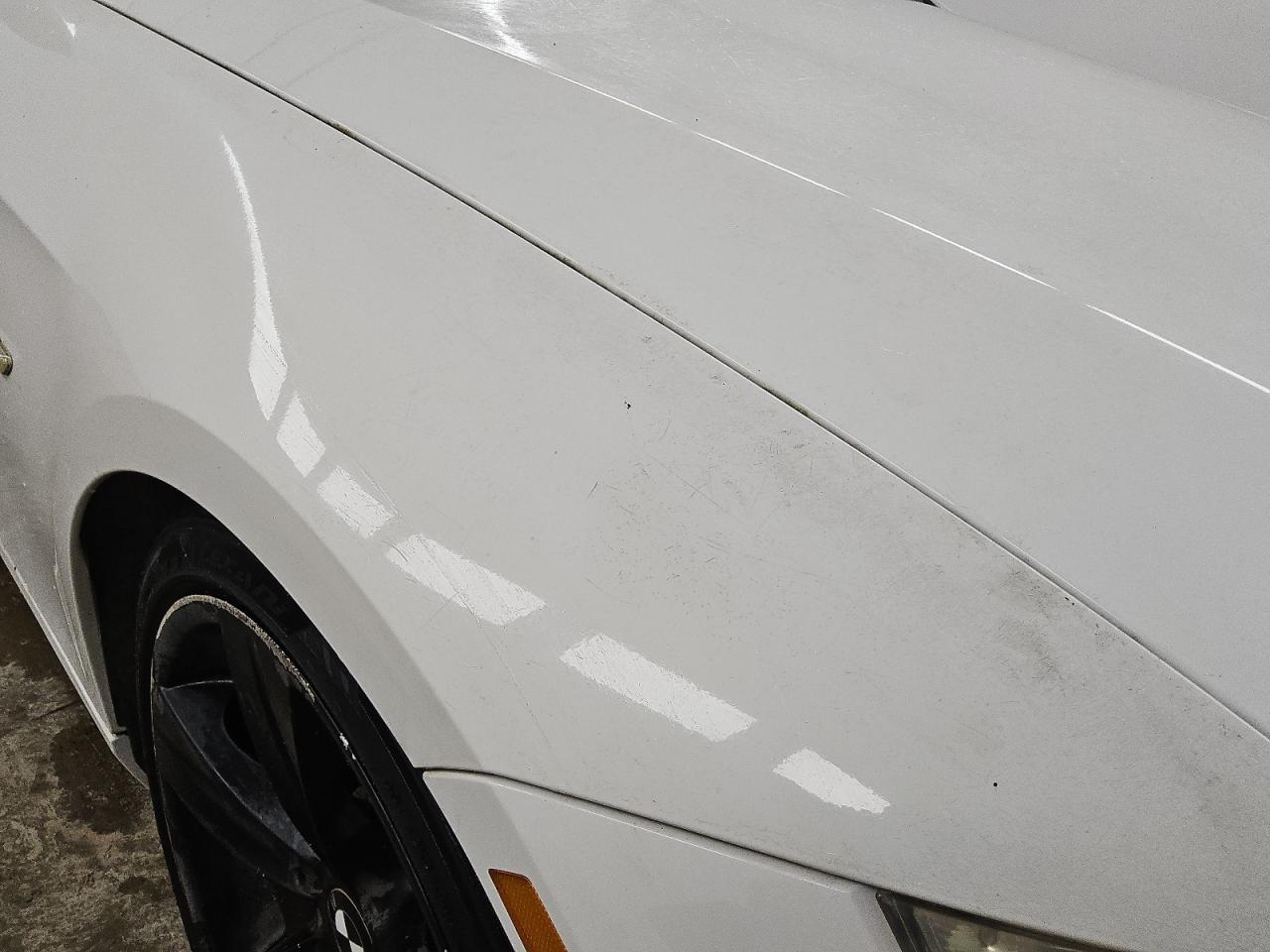 2009 Bmw 335 I White vin: WBAWL73519P473750 Damage: Right Front Fender, Heavy Scratch, 5 To 6 Inches