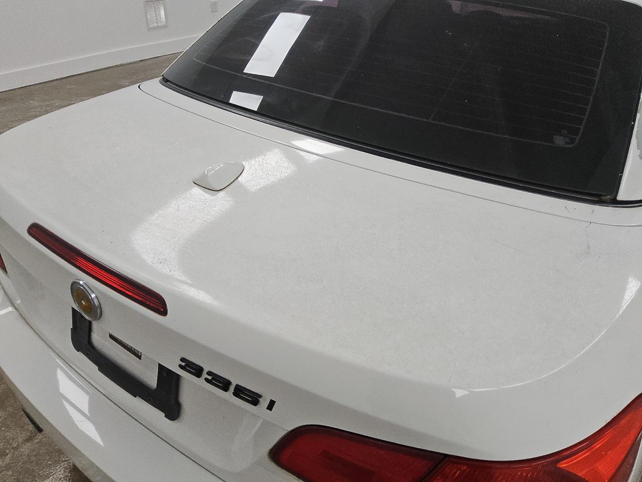 2009 Bmw 335 I White vin: WBAWL73519P473750 Damage: Deck Lid, Previous Repair, Substandard Repair