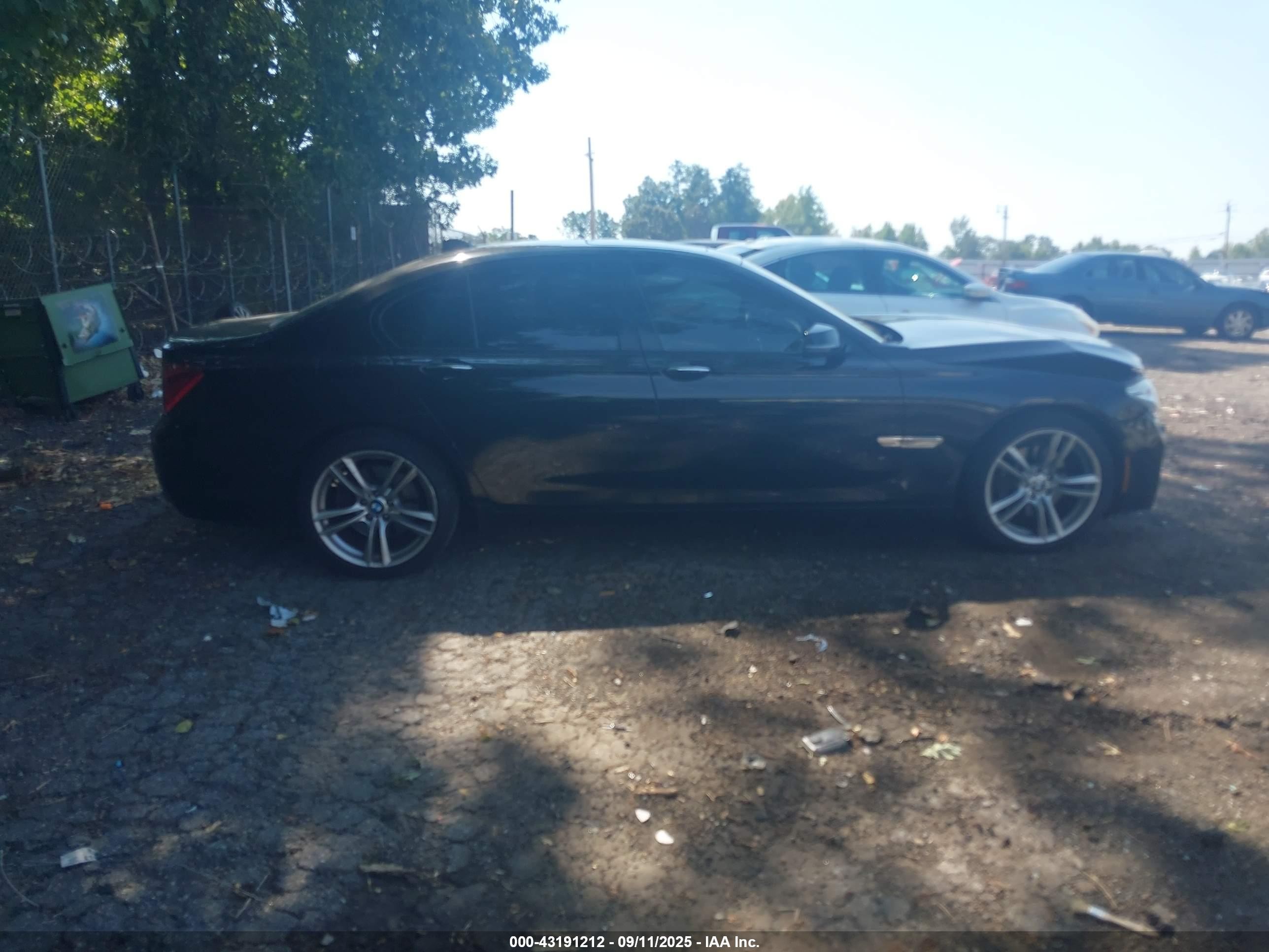 2014 Bmw 740i   Black vin: WBAYA6C52ED144477