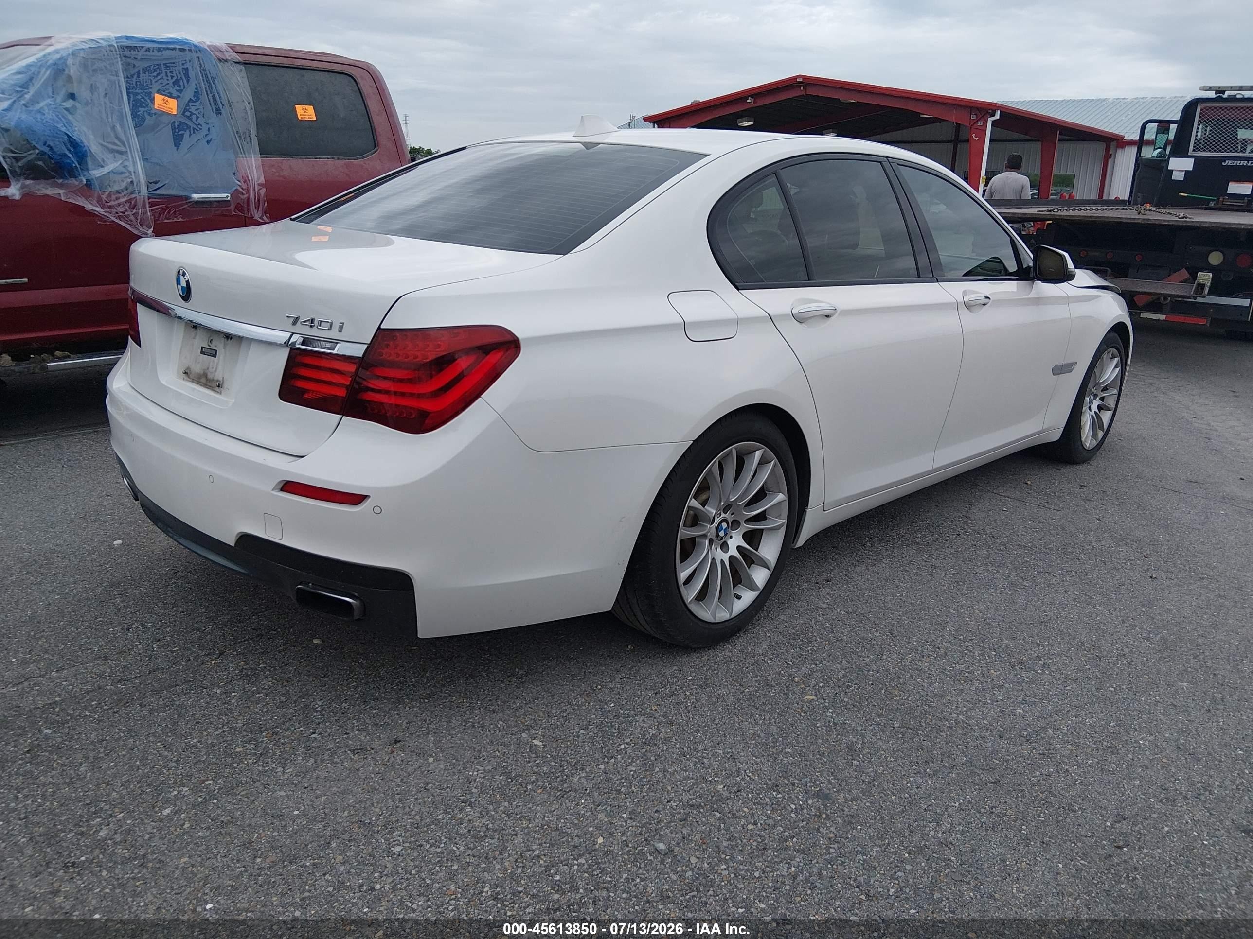 2014 Bmw 740i   White vin: WBAYA6C53ED144505