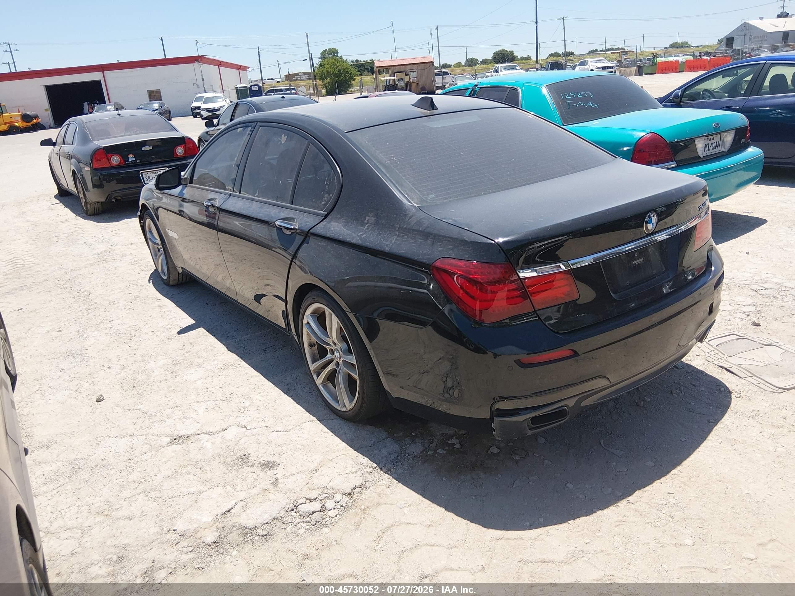 2014 Bmw 740i   Black vin: WBAYA6C58ED144516