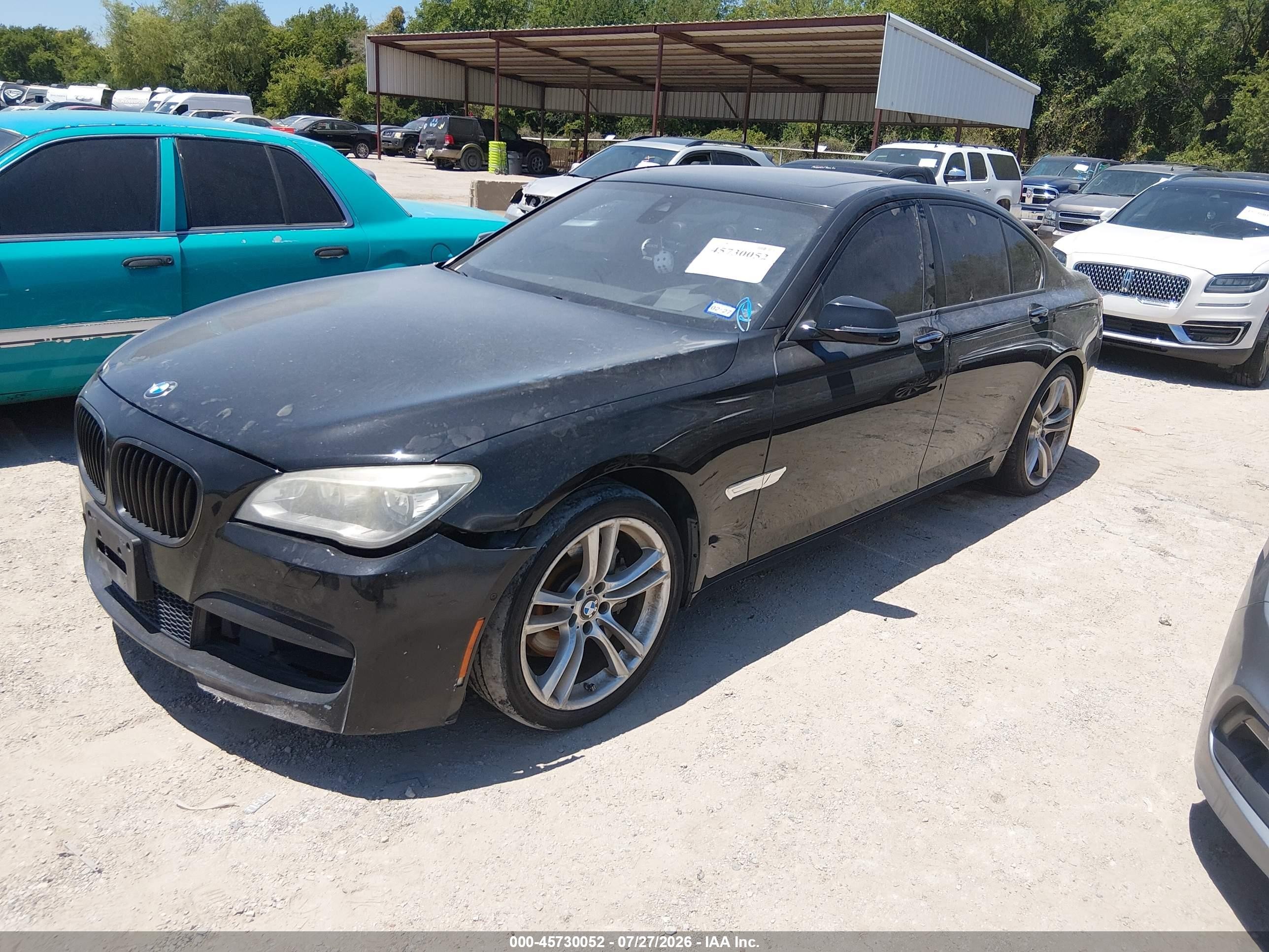 2014 Bmw 740i   Black vin: WBAYA6C58ED144516