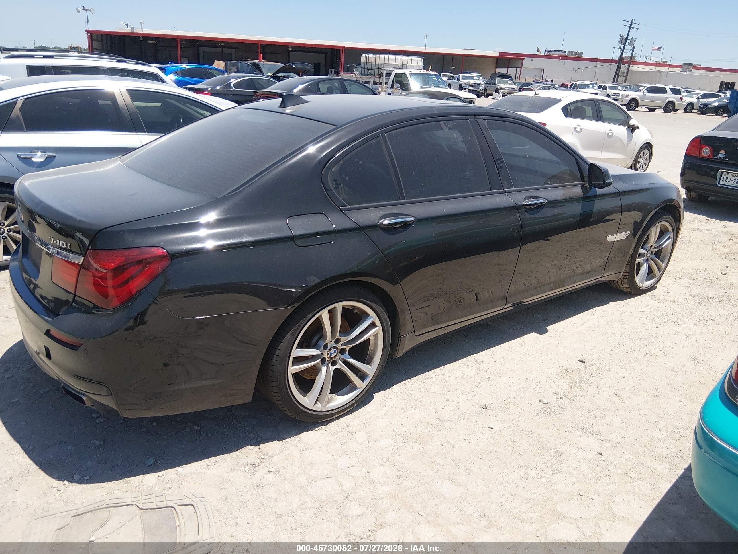 2014 Bmw 740i   Black vin: WBAYA6C58ED144516