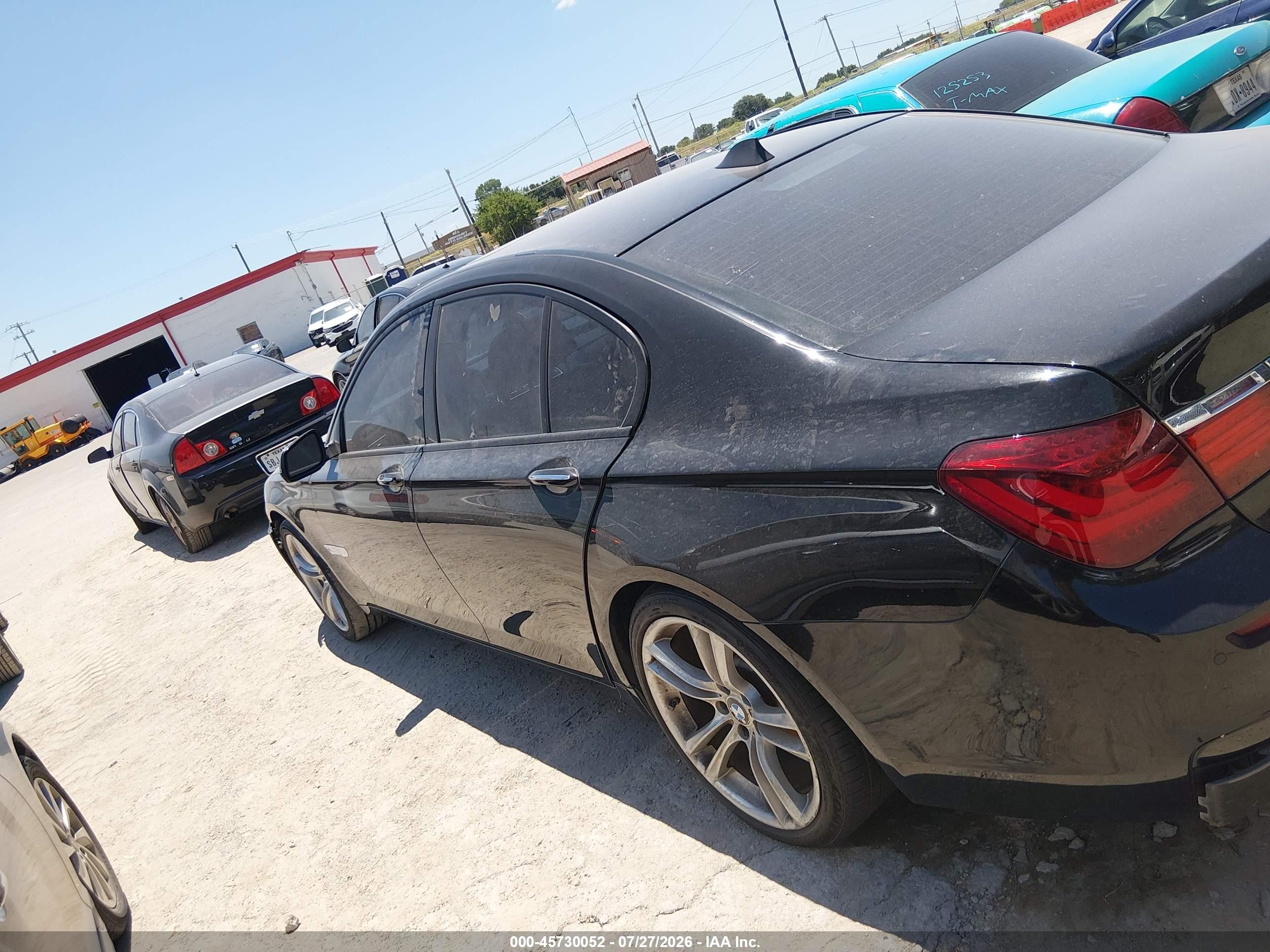 2014 Bmw 740i   Black vin: WBAYA6C58ED144516
