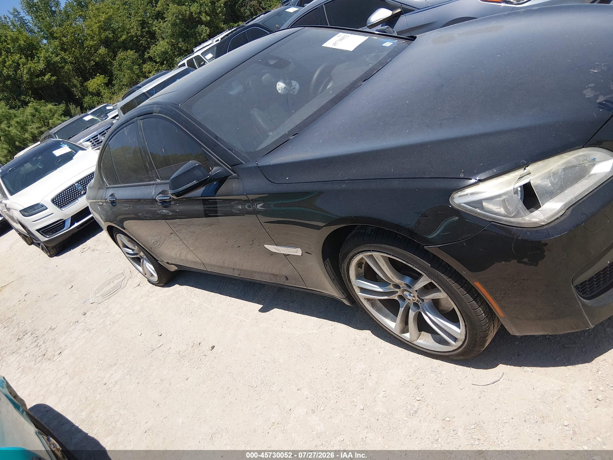 2014 Bmw 740i   Black vin: WBAYA6C58ED144516