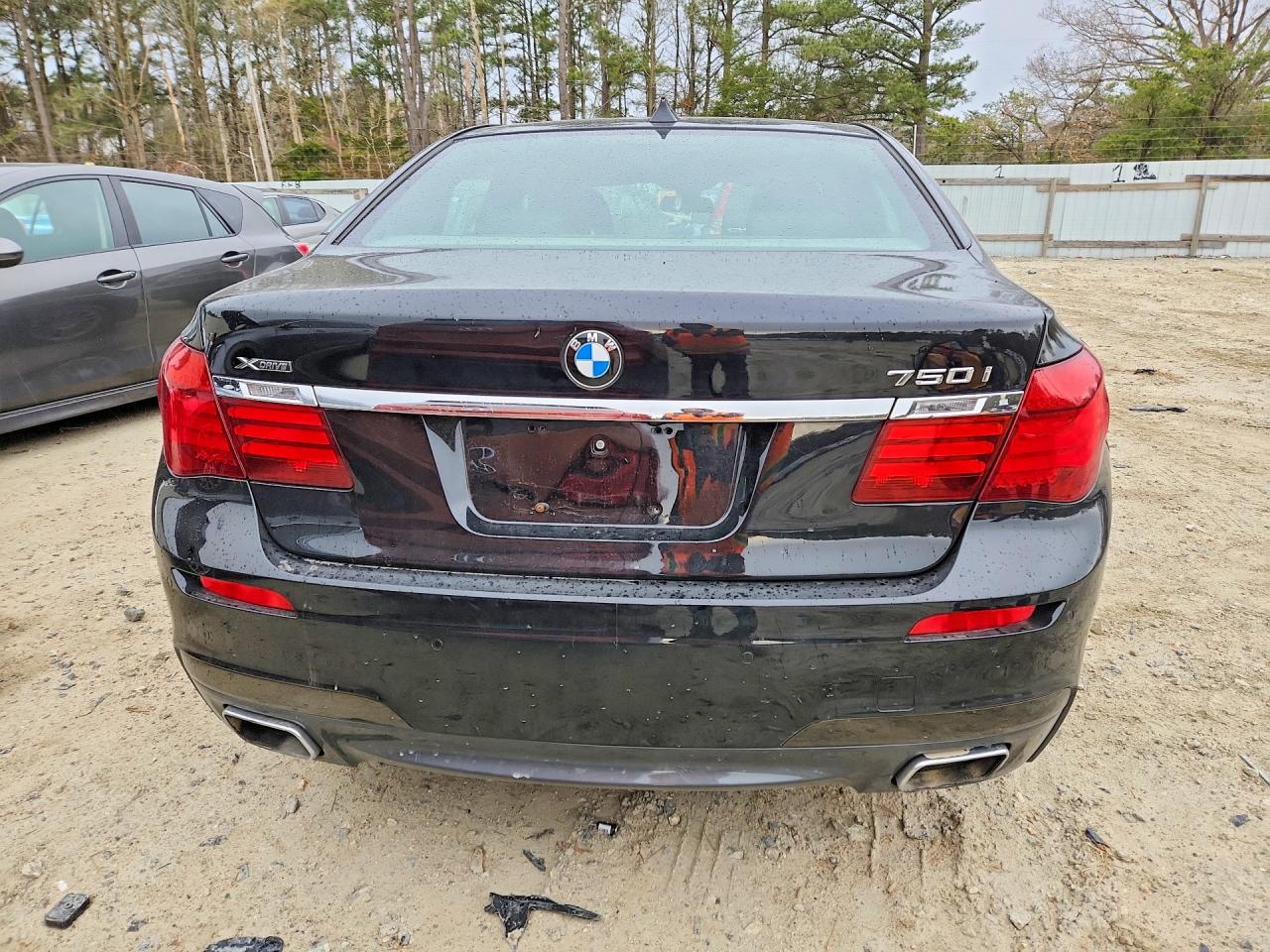 2014 Bmw 750 Xi Черный vin: WBAYB6C53ED224478