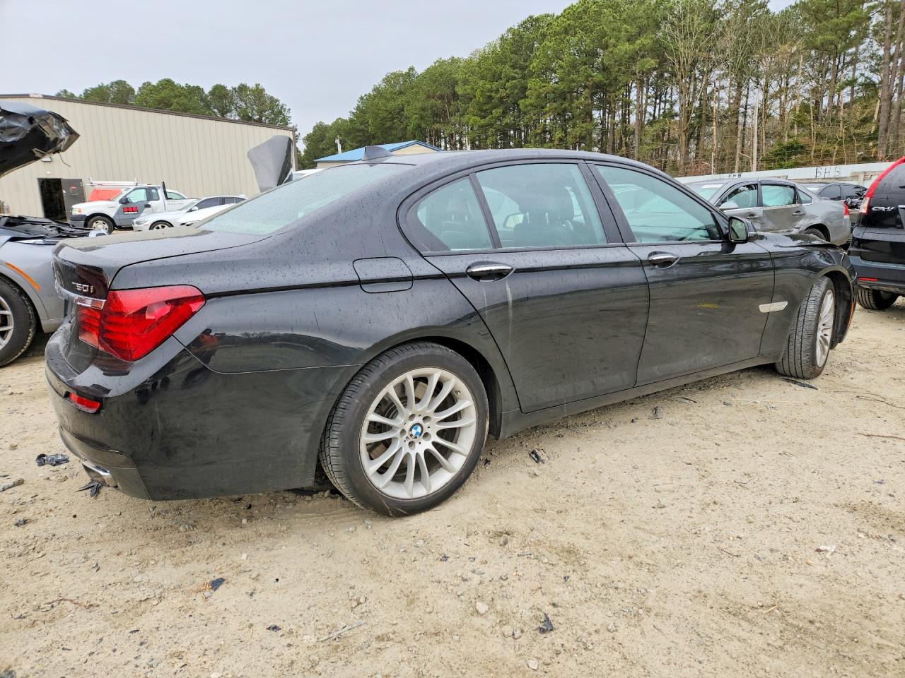 2014 Bmw 750 Xi Черный vin: WBAYB6C53ED224478