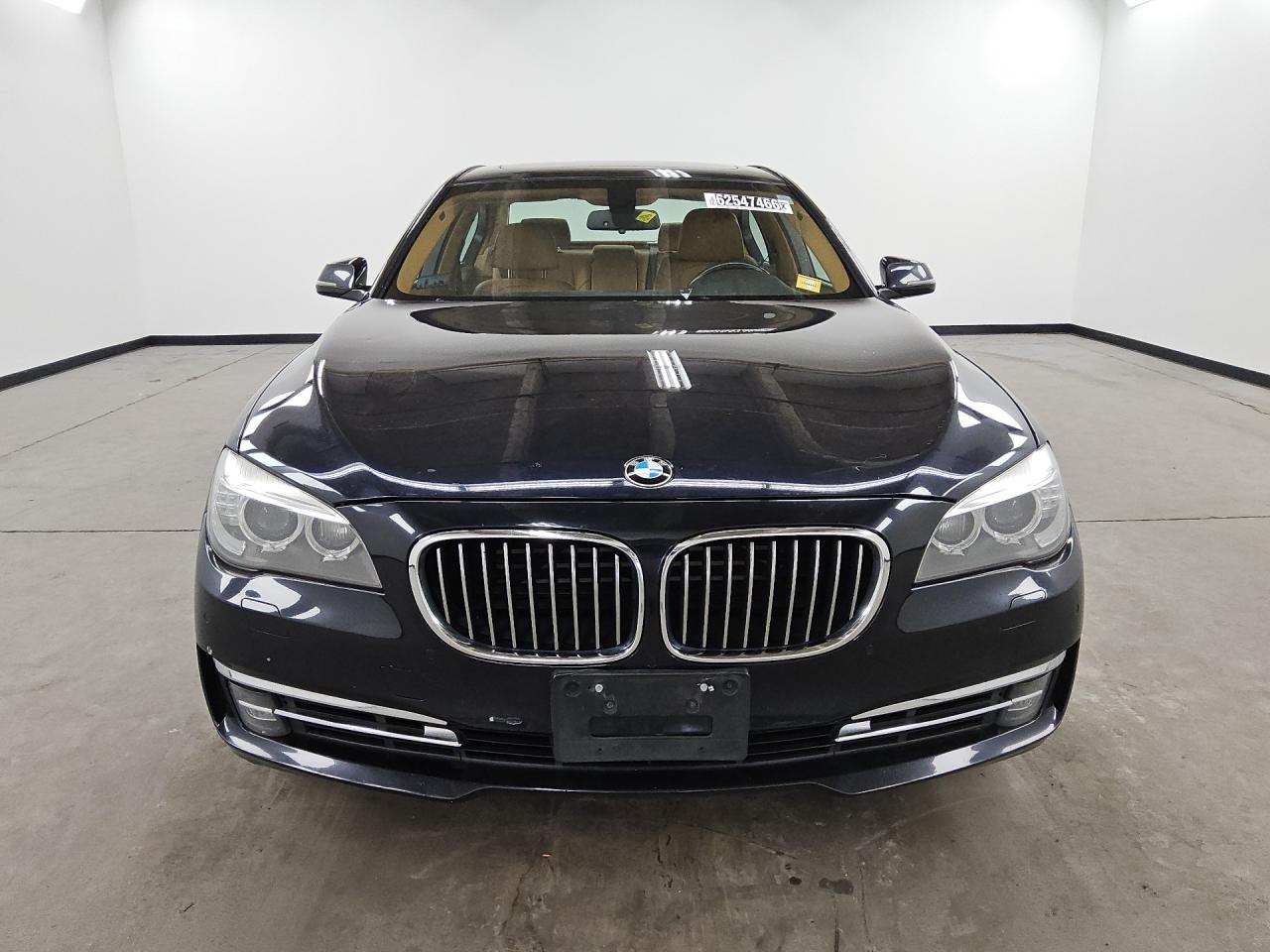 2013 Bmw 750 Xi Black vin: WBAYB6C56DC998261 Damage: Left Head Lamp, Faded, Repair Required