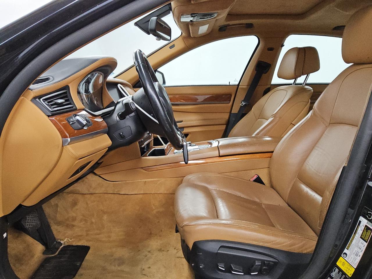 2013 Bmw 750 Xi Black vin: WBAYB6C56DC998261 Damage: Left Front Carpet, Stained, Permanent