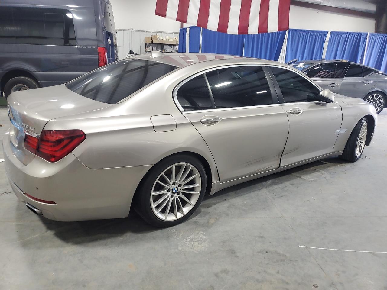 2015 Bmw 7 Series Beige vin: WBAYE8C53FD780939 Damage: Right Rocker Panel, Dent(S) W/ Paint Dmg, 5 To 6 Inches