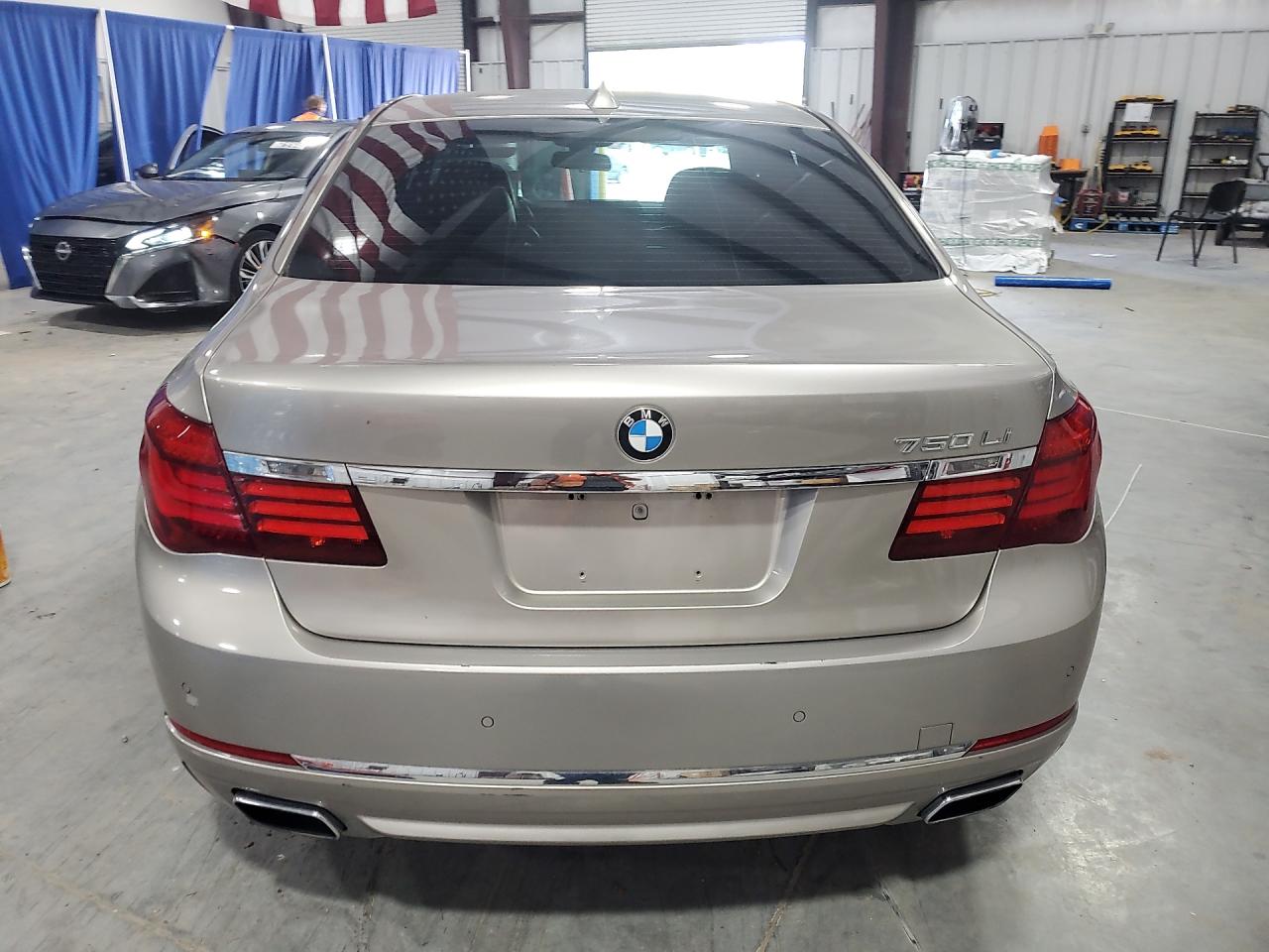 2015 Bmw 7 Series Beige vin: WBAYE8C53FD780939 Damage: Rear Bumper, Heavy Scratch, 1/2 To 1 Inch