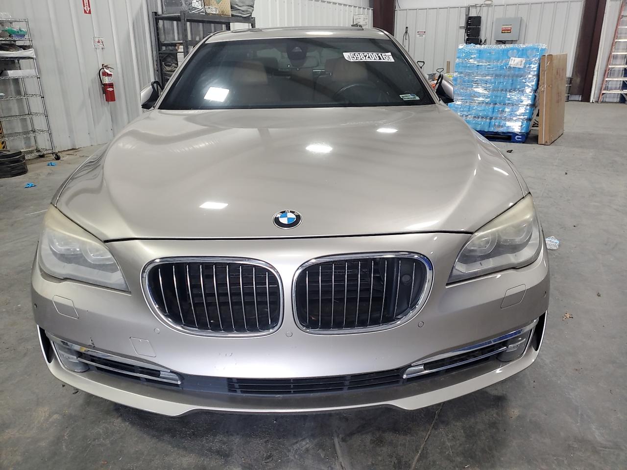 2015 Bmw 7 Series Beige vin: WBAYE8C53FD780939 Damage: Left Head Lamp, Faded, Repair Required