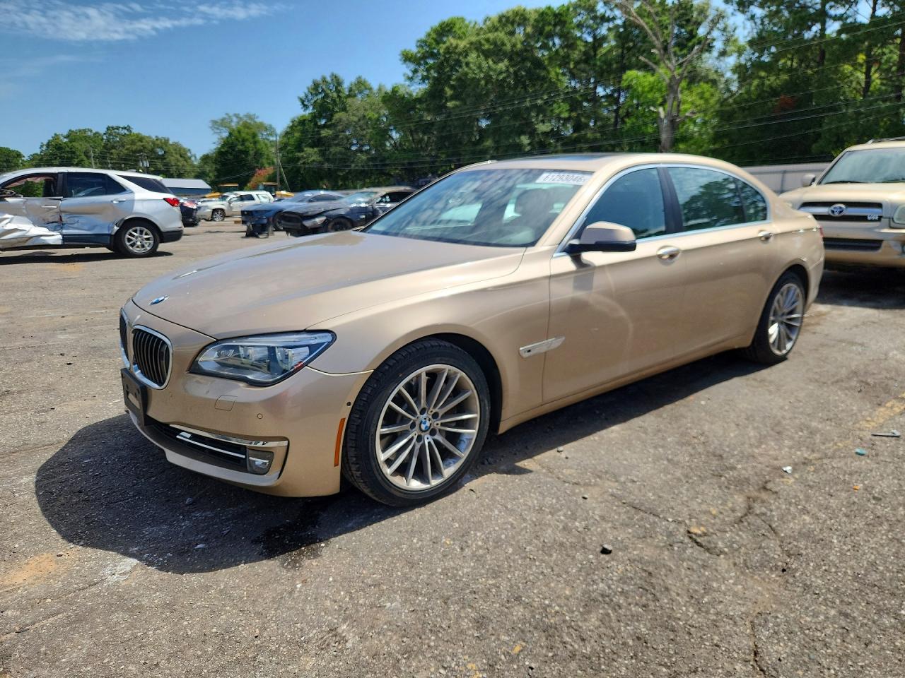 2014 Bmw 750 Li Золотой vin: WBAYE8C54ED136476