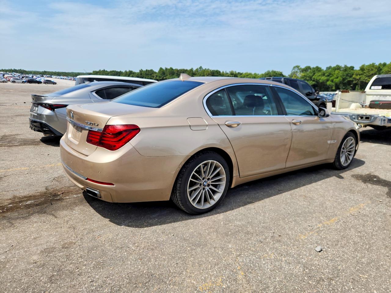 2014 Bmw 750 Li Золотой vin: WBAYE8C54ED136476