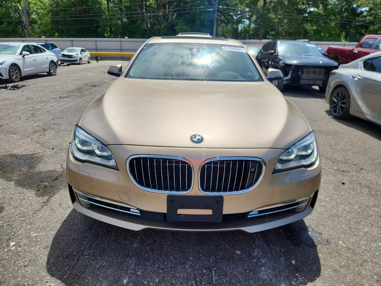 2014 Bmw 750 Li Золотой vin: WBAYE8C54ED136476