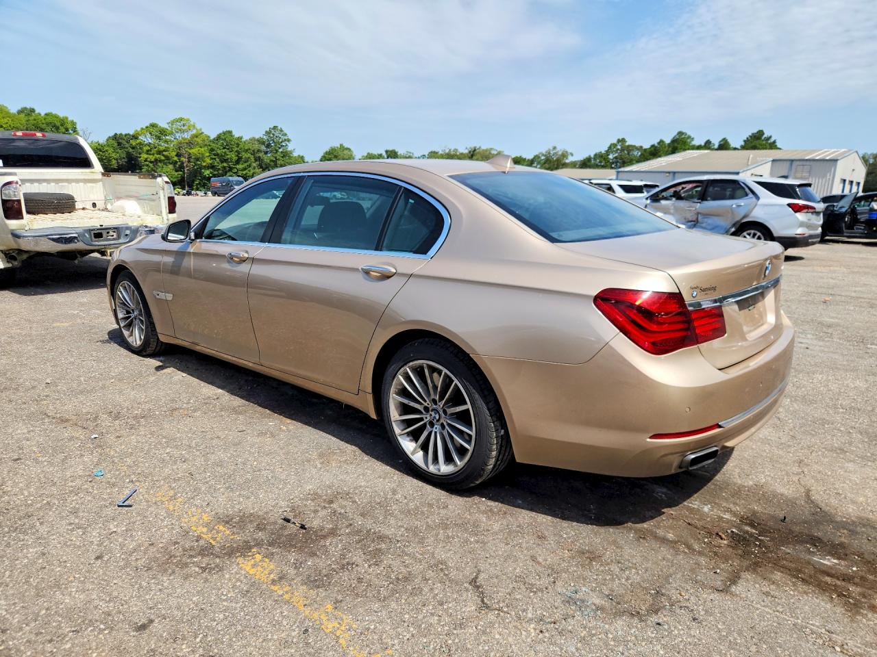 2014 Bmw 750 Li Золотой vin: WBAYE8C54ED136476