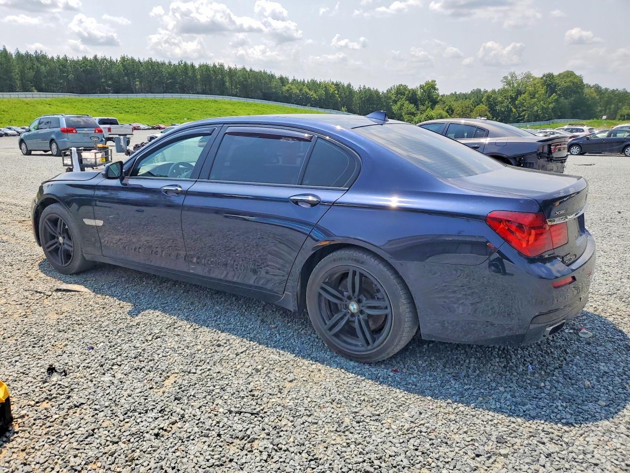 2015 Bmw 740 Lxi Blue vin: WBAYF4C55FG291818