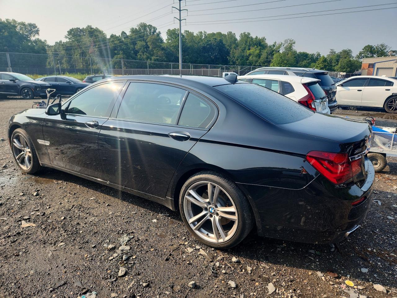 2015 Bmw 740 Lxi Black vin: WBAYF4C56FD874013
