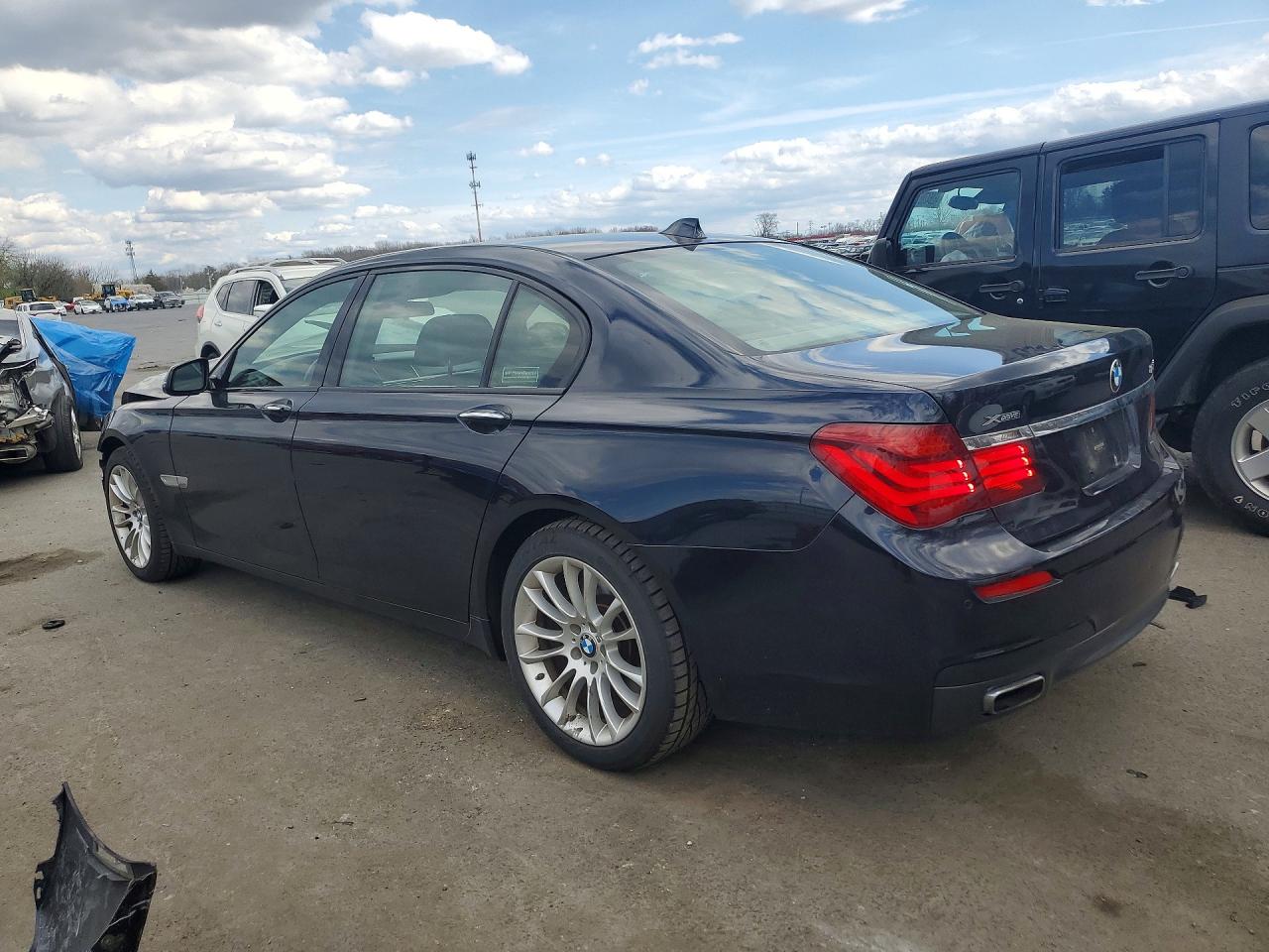 2014 Bmw 750 Lxi Black vin: WBAYF8C56ED653047