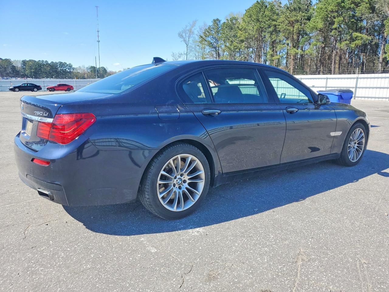 2014 Bmw 750 Lxi Черный vin: WBAYF8C57ED653767