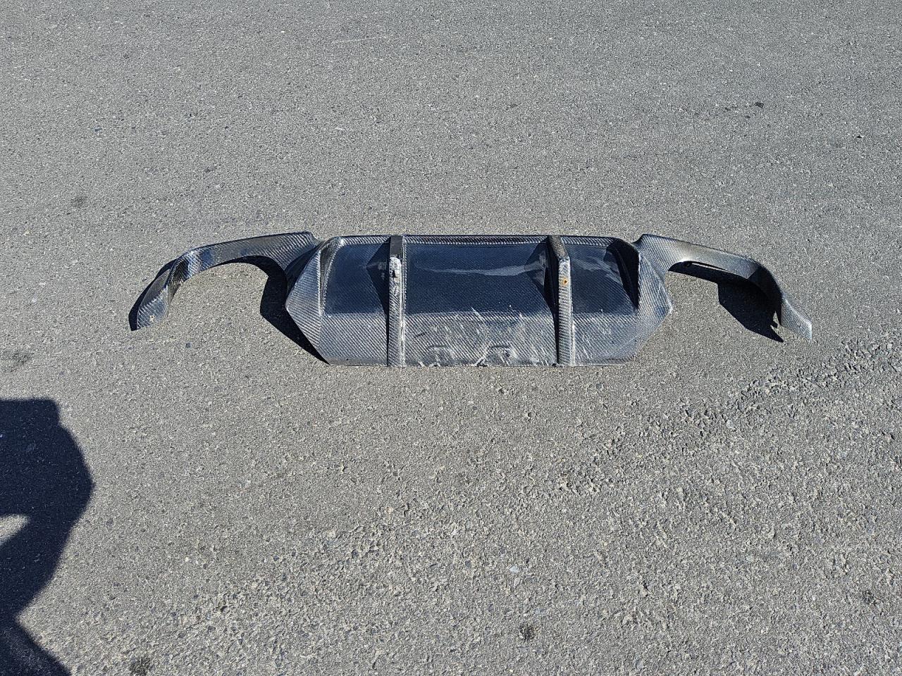 2013 Bmw M5 Gray vin: WBSFV9C55DC773731 Damage: Rear Bumper Center Molding, Broken, Replacement Required