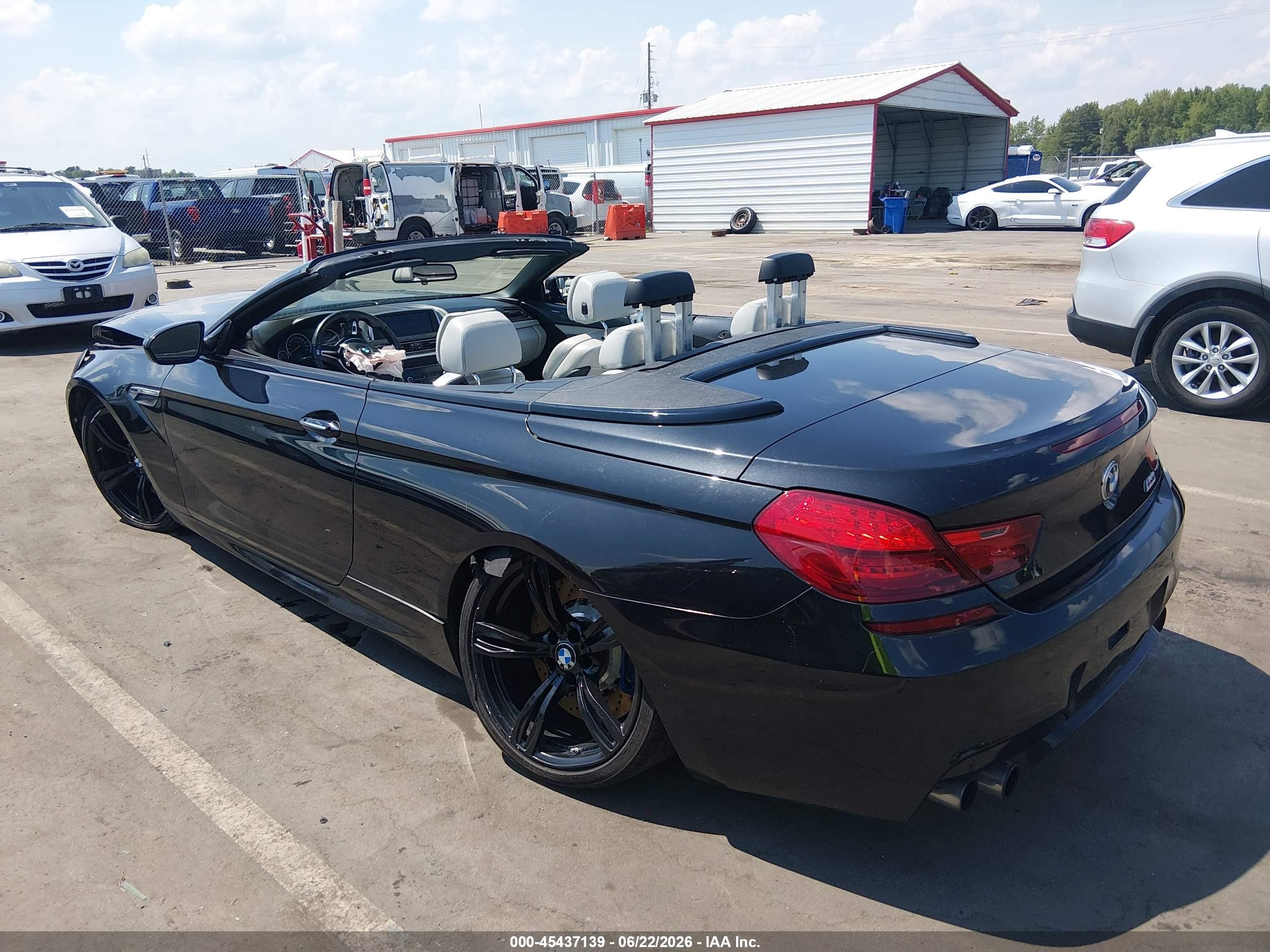 2015 Bmw M6   Черный vin: WBSLZ9C5XFD651449