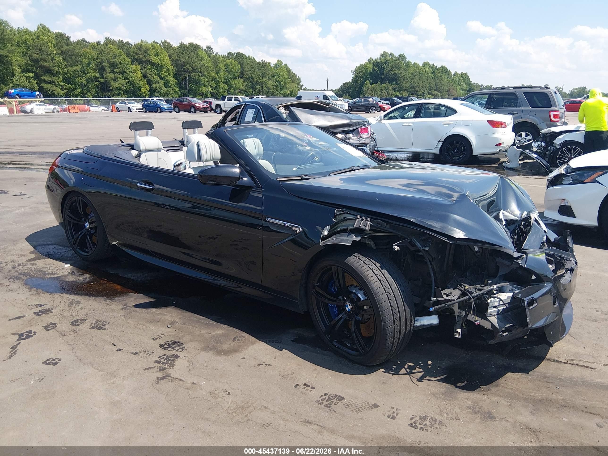 2015 Bmw M6   Черный vin: WBSLZ9C5XFD651449