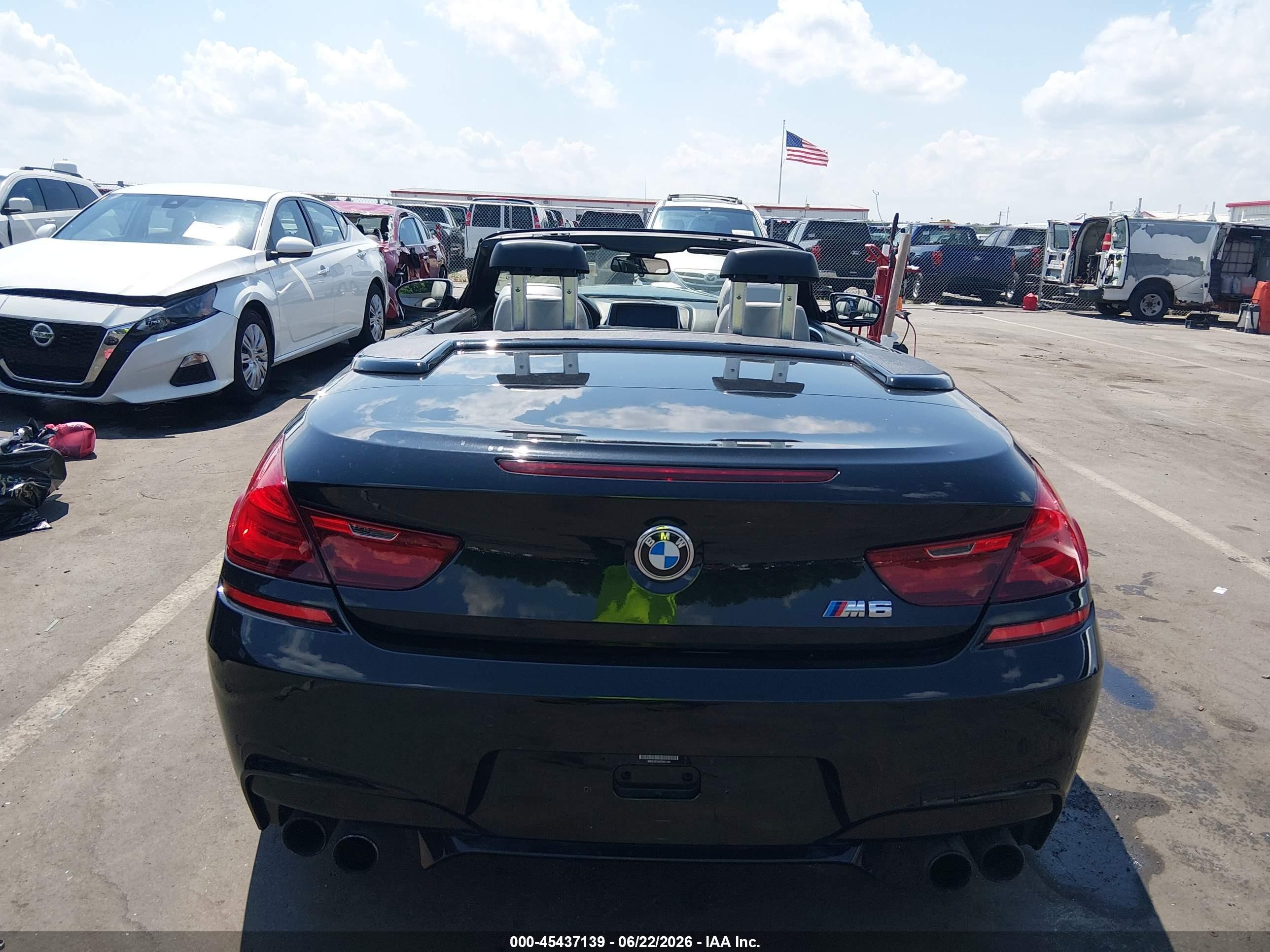 2015 Bmw M6   Черный vin: WBSLZ9C5XFD651449