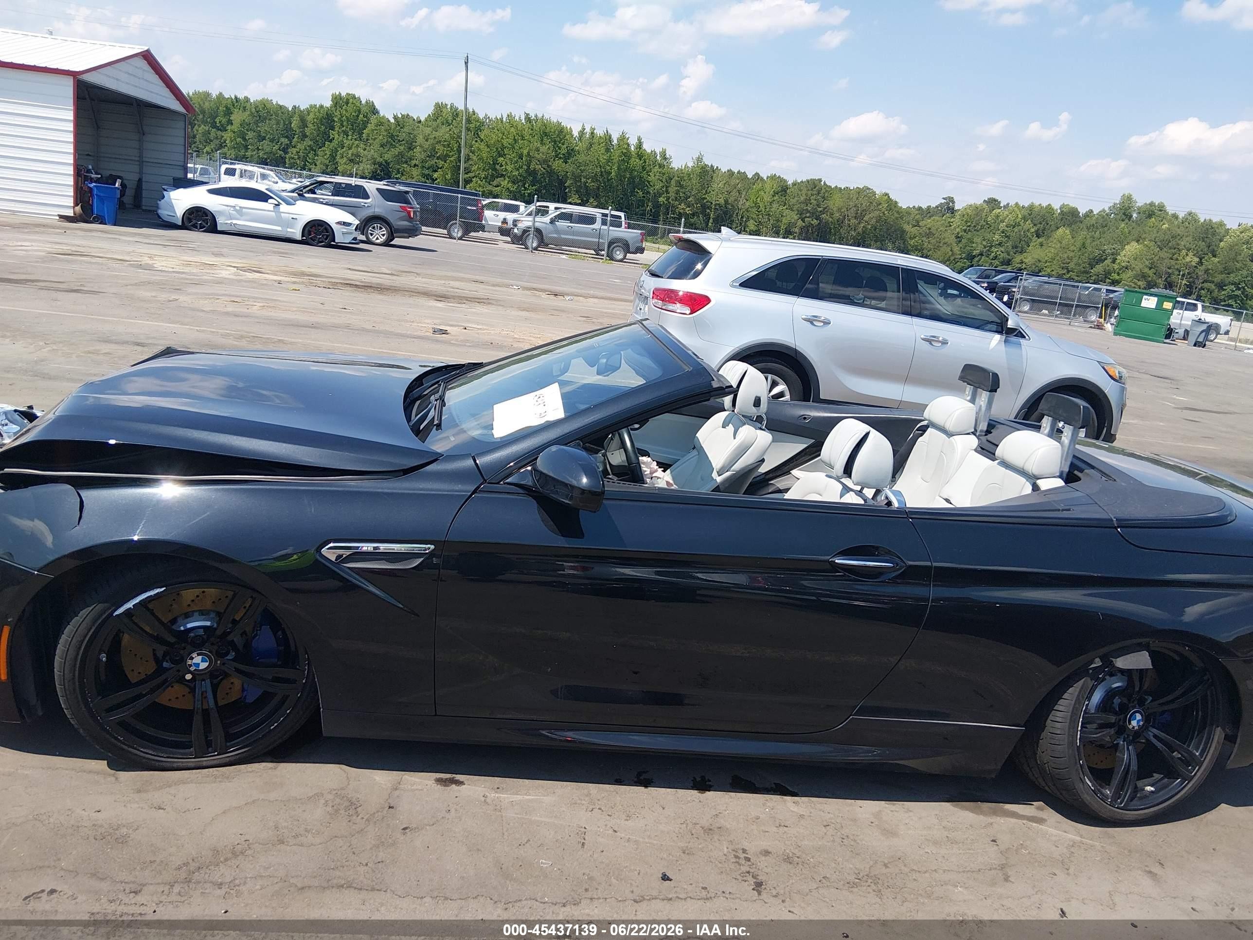 2015 Bmw M6   Черный vin: WBSLZ9C5XFD651449