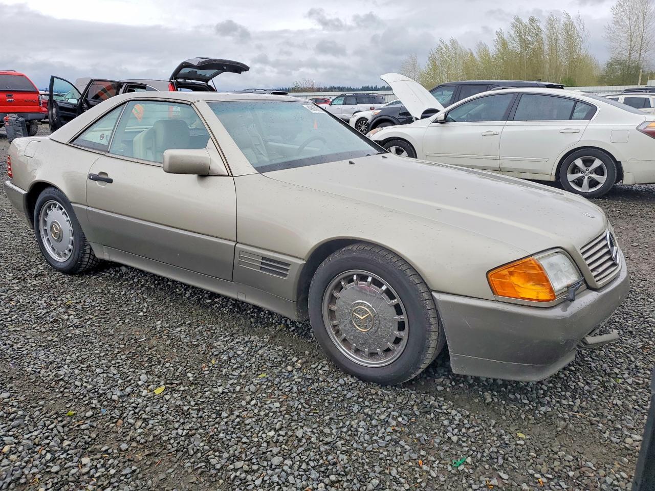 1991 Mercedes Benz 300 Sl Gold vin: WDBFA61E6MF015639