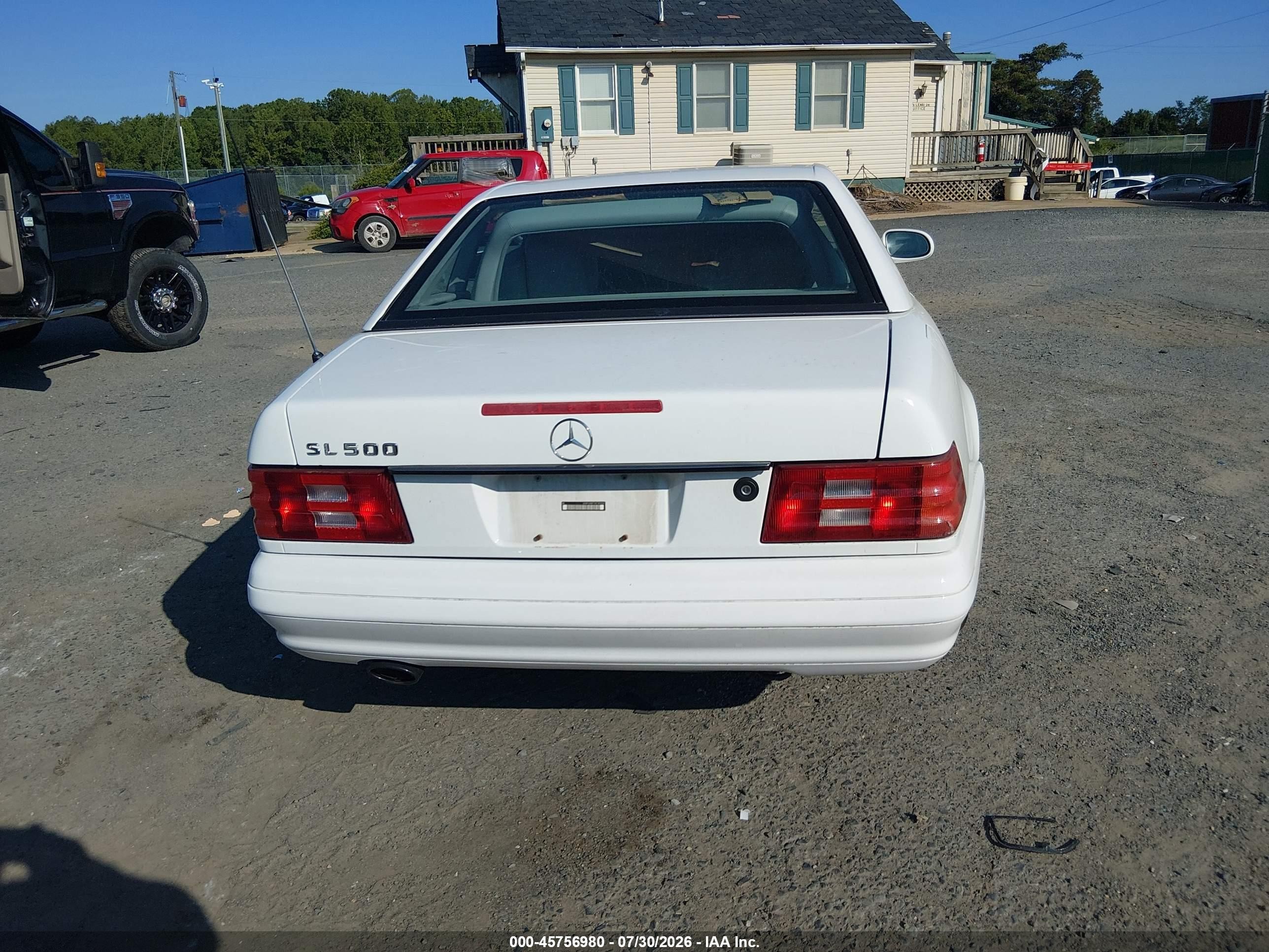 1999 Mercedes-benz Sl 500 White vin: WDBFA68F7XF187830