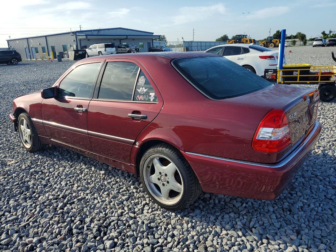 1999 Mercedes-benz C 230 Burgundy vin: WDBHA24G3XA717613