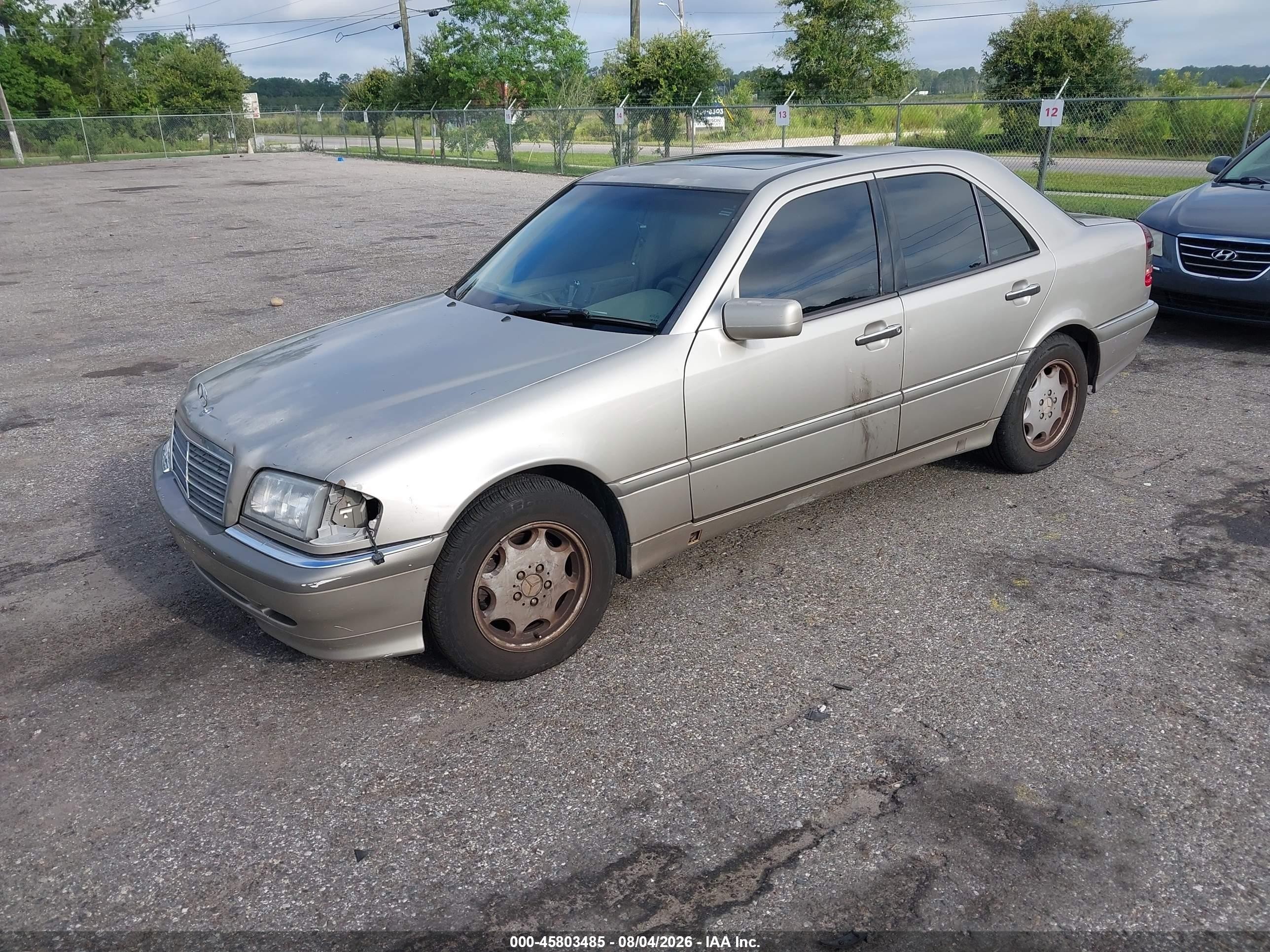 1999 Mercedes-benz C 280   Gold vin: WDBHA29G5XA672036