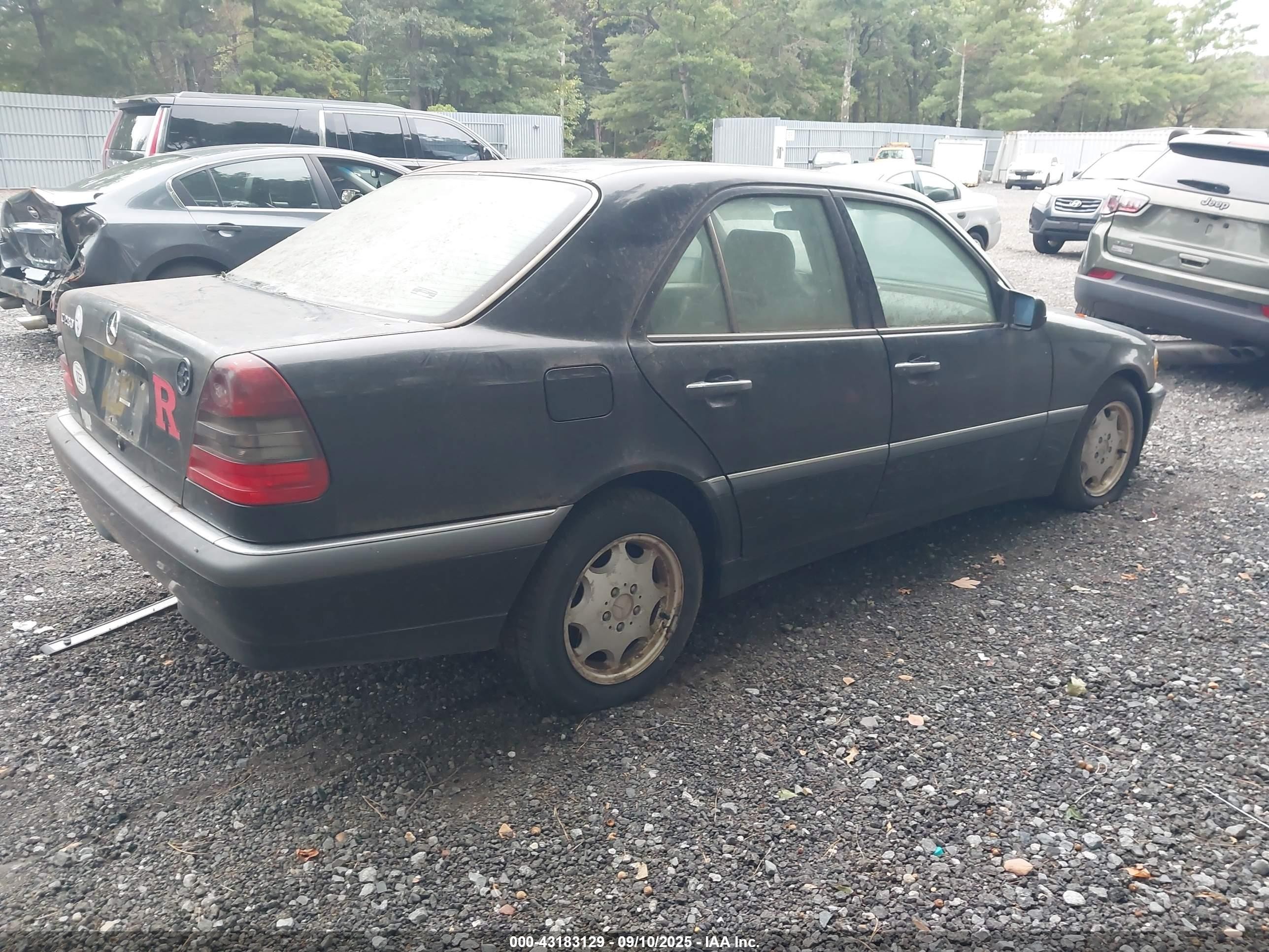 1999 Mercedes-benz C 280   Black vin: WDBHA29G6XA755085