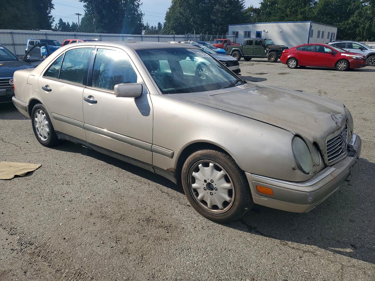 1997 Mercedes-benz E 320 Beige vin: WDBJF55F5VA351290