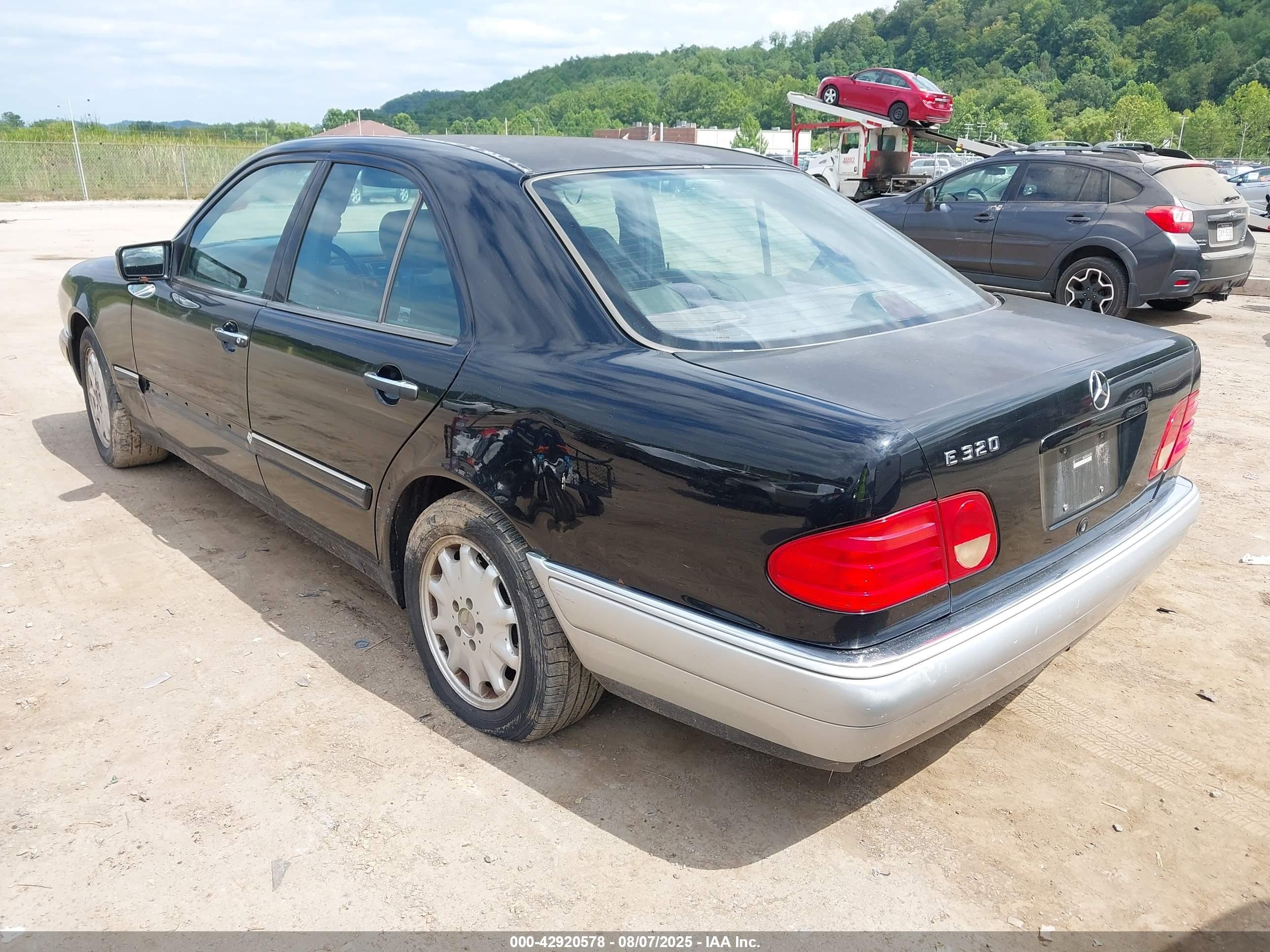 1998 Mercedes-benz E 320   Black vin: WDBJF65F9WA644567