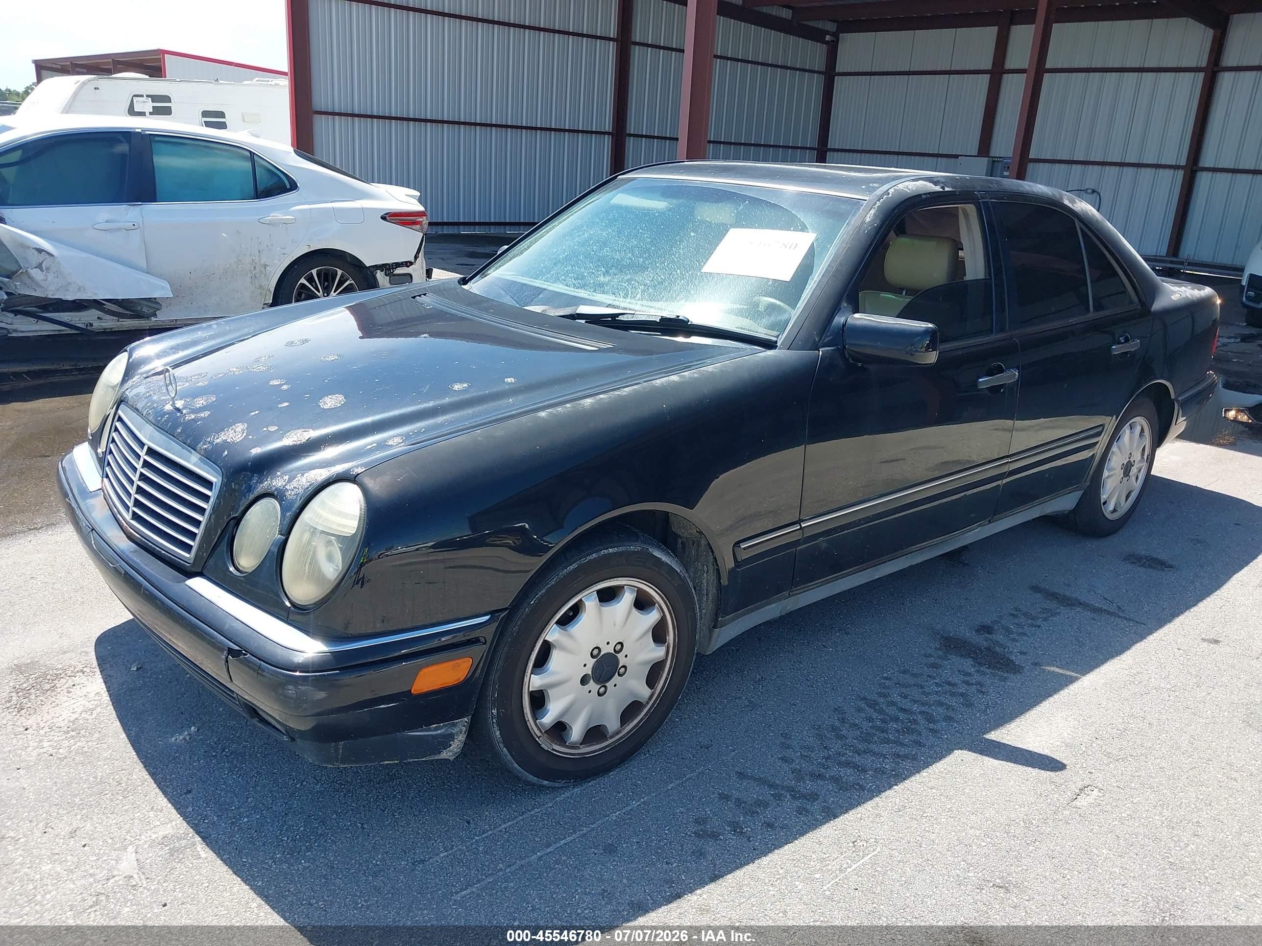 1999 Mercedes-benz E 320   Black vin: WDBJF65H4XA833887